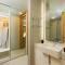 Oceanstone by Holy Cow, studio, next building view