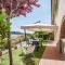 Casetta Luna e Sole Giardino privato e vista Toscana