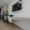 Simply Furnished Studio at Menteng Park Apartment By Travelio