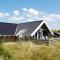 Foto: Three-Bedroom Holiday home in Ringkøbing 7