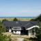 Foto: Three-Bedroom Holiday home in Jerup 8