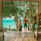 Whispering Palms - Absolute Beachfront Villas