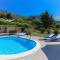 Holiday Home Rupotina with a large yard, pool and a beautiful view