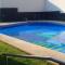 Apartamentos Deluxe Roquetas de Mar con Golf y Piscina Climatizada, Parking privado - Vícar