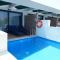 Foto: Cavo Orient Beach Hotel & Suites 97/120