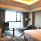 Foto: Grand Skylight International Hotel Gongqingcheng 10/45