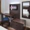 Luxbury Inn & Suites