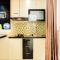 Simply 2BR with Pool View Bassura City Apartment By Travelio