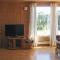 Foto: Three-Bedroom Holiday Home in Rygge 6/10