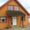 Foto: Three-Bedroom Holiday Home in Holmedal 1/12