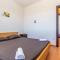 Foto: Three-Bedroom Apartment in Jablanac 19/32