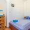 Foto: Three-Bedroom Apartment in Jablanac 21/32