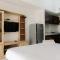 Comfortable and Spacious Studio Casa De Parco Apartment By Travelio