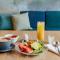 Glo Hotel Sello