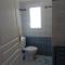 Appartement en rez de chaussee de maison