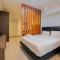 Elegant 1BR at Grand Kamala Lagoon Apartment By Travelio