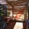 Bungalow cosy avec piscine surplombant locéan