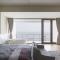 Foto: Qingdao Pusu Qi Lan Sea Residence 18/64