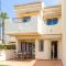 STYLISH TOWNHOUSE IN BEACHFRONT COMPLEX