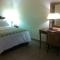 Foto: Micro Hotel Condo Suites 6/13