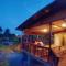 Tungs Tropika - With a Wooden Hut by a Lake