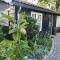 Foto: Cottage in secluded garden near centre Rotterdam