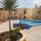 Comfortable apartment next to the pools