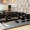 Modern and Spacious Home From Home 1 mile from M1 - with Netflix, Prime Video, PS5, free parking, superfast WiFi, BBQ - Sleeps 11 - By Brightleap Apartments