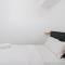 Comfortable 2BR Apartment at M-Town Residence By Travelio