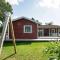 Foto: Three-Bedroom Holiday home in Ørsted 4 3/30