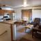 Wolf Den Log Cabin Motel and RV Park