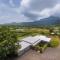 SaffronStays Serenity - 2BR villa overlooking Lake Kadwa with garden, swings & treks near Sula Vineyard