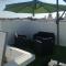 Apartamento con terraza privada y piscinas