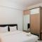 Cozy with City View Studio at Scientia Apartment By Travelio
