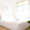 Classic and Comfy 2BR @ Gateway Pasteur Apartment By Travelio