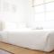 Classic and Comfy 2BR @ Gateway Pasteur Apartment By Travelio