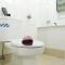 City View 2BR Apartment Bassura City near Shopping Mall By Travelio
