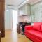 City View 2BR Apartment Bassura City near Shopping Mall By Travelio