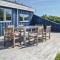 Foto: Three-Bedroom Holiday Home in Harboore 3/11