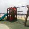 Cozy 1BR Apartment Grand Kamala Lagoon By Travelio