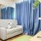 Cozy 1BR Apartment Grand Kamala Lagoon By Travelio