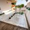 Alga 5-Star Boutique Apartment Steps from the Sea