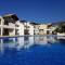 Stunning apartment C106 with balcony looking over pool