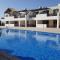 Stunning apartment C106 with balcony looking over pool