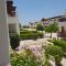 Stunning apartment C106 with balcony looking over pool