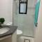 Apartamento novo 3/4, bem aconchegante na farolândia, todos os quartos com ar condicionado - 阿拉卡茹