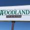 Woodland Inn & Suites