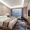 Auto City Ruili Hotel