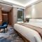 Auto City Ruili Hotel