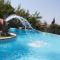Tranquil Infinity Pool Getaway (private jacuzzi and steam bath, pool, garden, sea and city views) - Volos